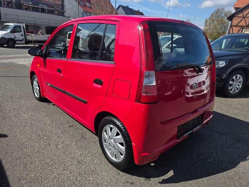 Gebraucht Daihatsu Cuore Plus 58 PS (42 kW) 2004 Rot Kleinwagen