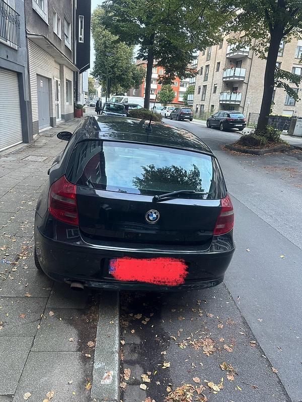 Gebraucht BMW 116 122 PS (89 kW) 2009 Schwarz Kleinwagen