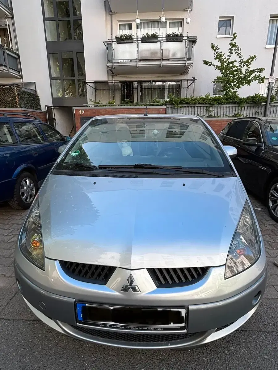 Second-hand Mitsubishi Colt 150 CP (110 kW) 2006 Gri Cabrio