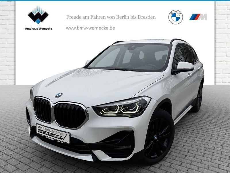 Mineralweiß Gebraucht 2021 BMW X1 Sport Line SUV | 23.990 € (Guter Preis) - Bild 1/4