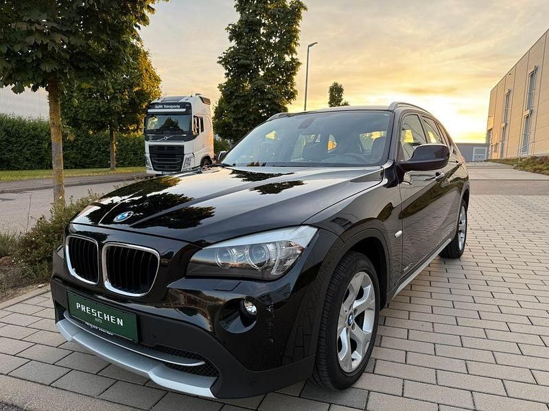 Schwarz Gebraucht 2011 BMW X1 Sport Line SUV | 11.376 € (Teuer) - Bild 1/4
