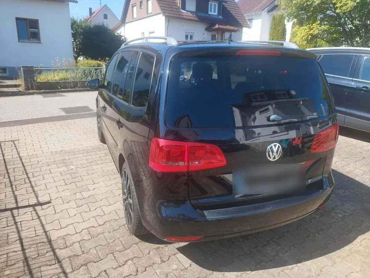 Gebraucht VW Touran Life 105 PS (77 kW) 2013 Schwarz Van / Kleinbus
