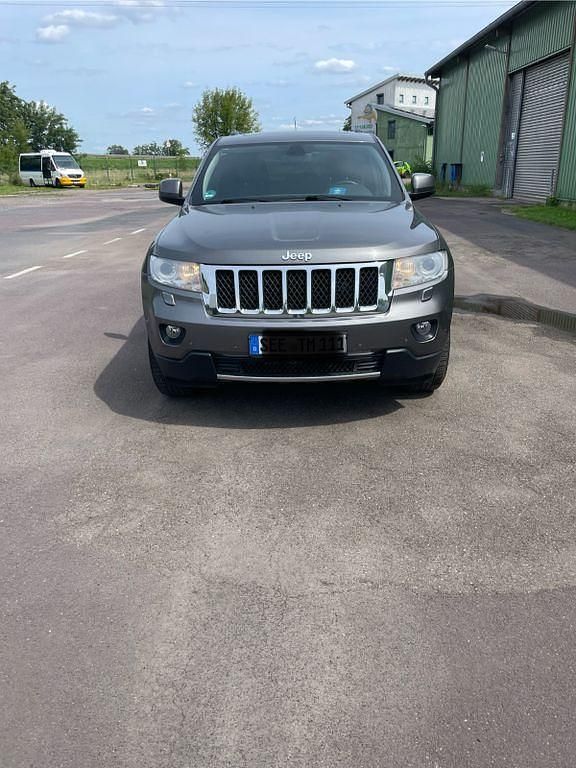 Grau Gebraucht 2012 Jeep Grand Cherokee Limited SUV | 11.600 € (Fairer Preis) - Bild 1/4