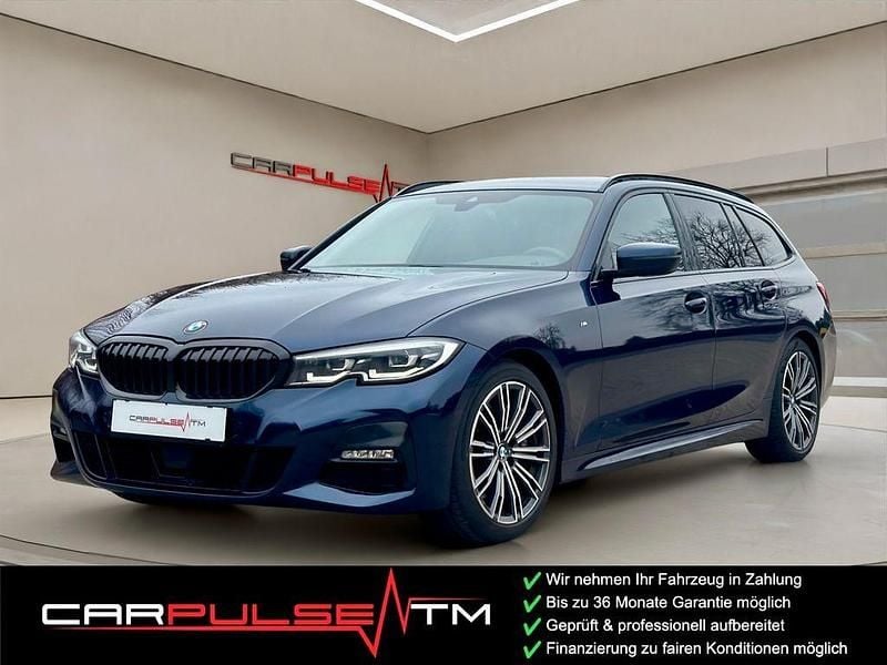 Tansanitblau ii metallic Gebraucht 2021 BMW 330 M Sport Kombi | 25.900 € (Guter Preis) - Bild 1/4