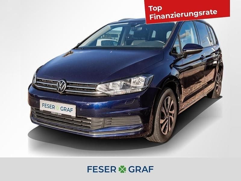 Atlantik blue metallic Gebraucht 2022 VW Touran Active Van / Kleinbus | 25.440 € (Guter Preis) - Bild 1/4