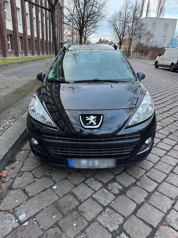 Gebraucht Peugeot 207 95 PS (69 kW) 2011 Schwarz Kombi