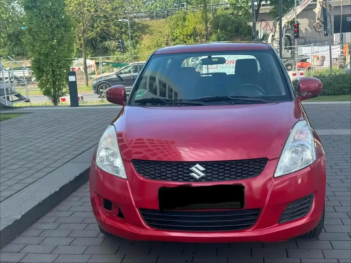 Gebraucht Suzuki Swift 94 PS (69 kW) 2011 Rot Kleinwagen