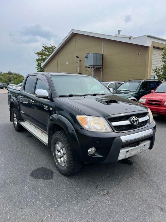 Schwarz Gebraucht 2008 Toyota HiLux Abholung | 9.900 € (Fairer Preis) - Bild 1/4