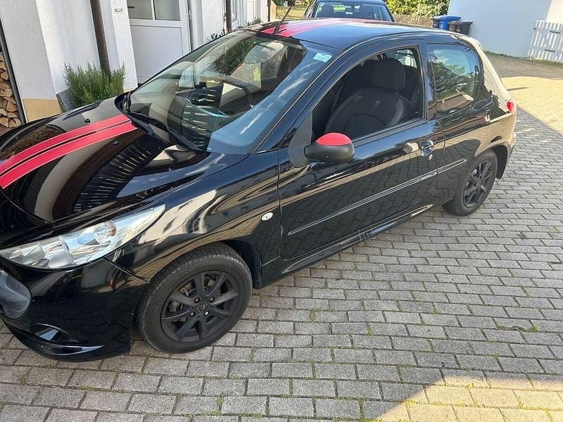 Gebraucht Peugeot 206 73 PS (53 kW) 2010 Schwarz Limousine