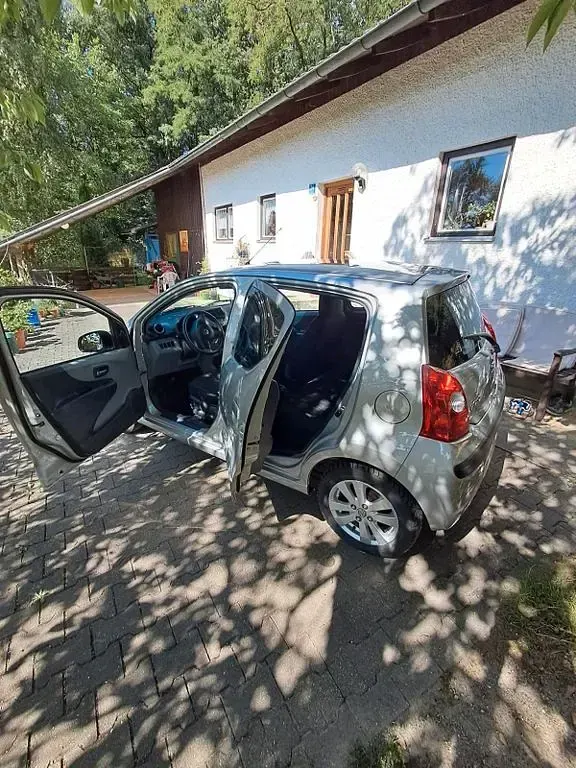 Gebraucht Nissan Pixo 68 PS (50 kW) 2012 Grau Kleinwagen