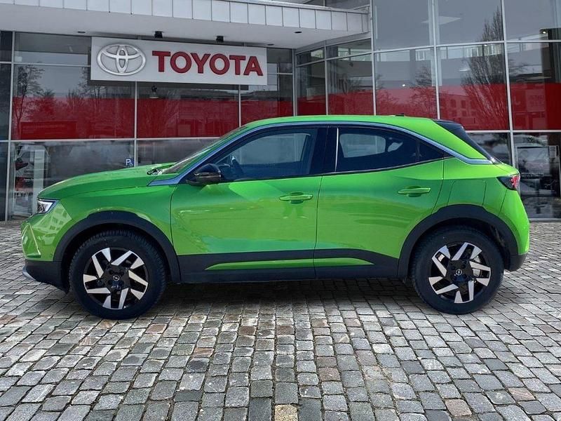 Gebraucht Opel Mokka Elegance 131 PS (96 kW) 2023 Matcha green/ikone gruen SUV