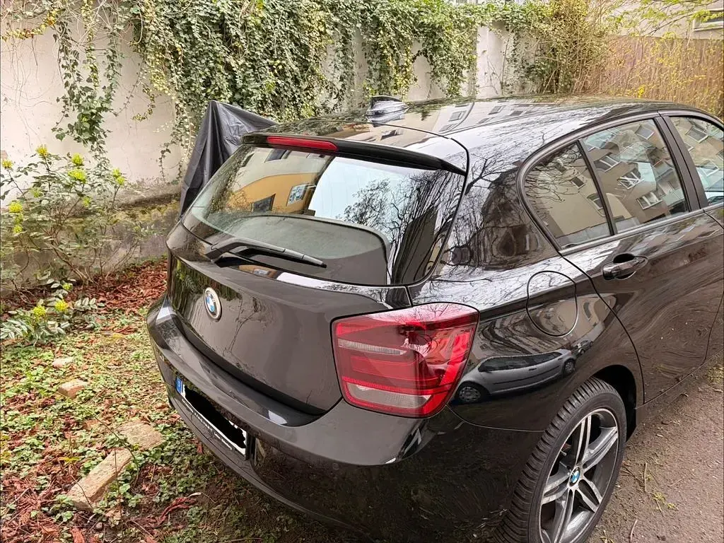 Gebraucht BMW 118 Sport Line 170 PS (125 kW) 2011 Schwarz Kleinwagen