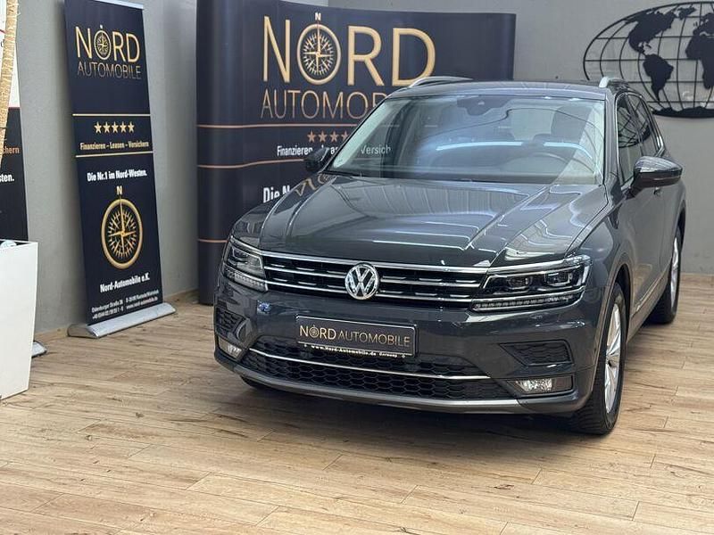 Grau Gebraucht 2020 VW Tiguan Highline SUV | 28.899 € (Fairer Preis) - Bild 1/3