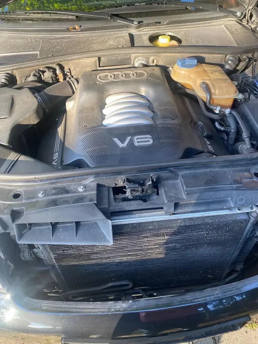 Używany Audi A6 165 KM (121 kW) 2001 Czarny Kombi