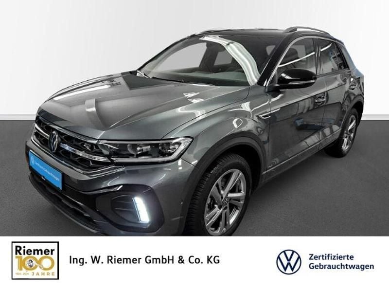 Indiumgrau metallic Gebraucht 2024 VW T-Roc R-line SUV | 31.589 € (Fairer Preis) - Bild 1/4