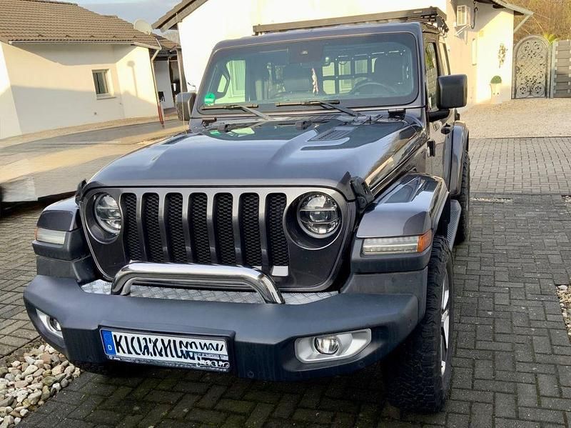 Grau Gebraucht 2020 Jeep Wrangler Sahara SUV | 41.400 € (Superpreis) - Bild 1/4