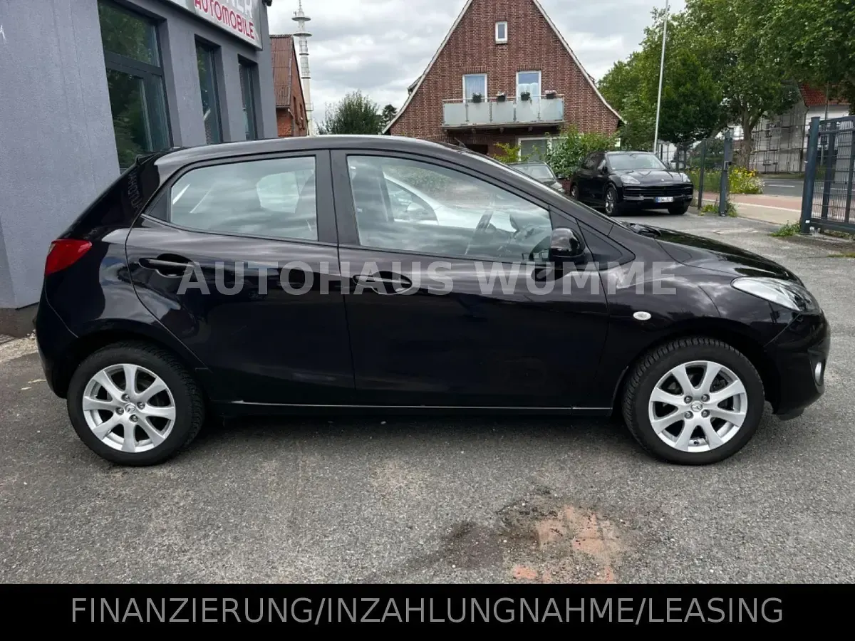 Gebraucht Mazda 2 Active 84 PS (61 kW) 2011 Violett Kleinwagen