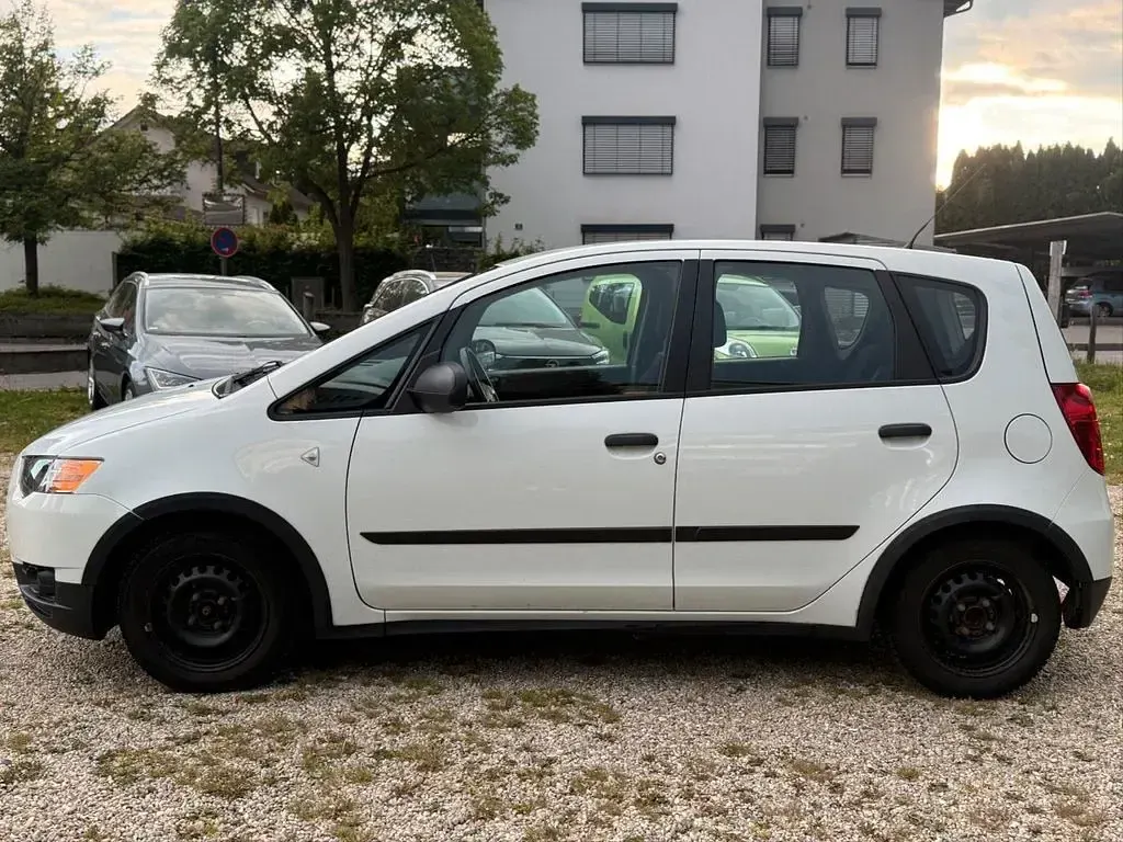 Gebraucht Mitsubishi Colt 95 PS (69 kW) 2011 Weiß Kleinwagen