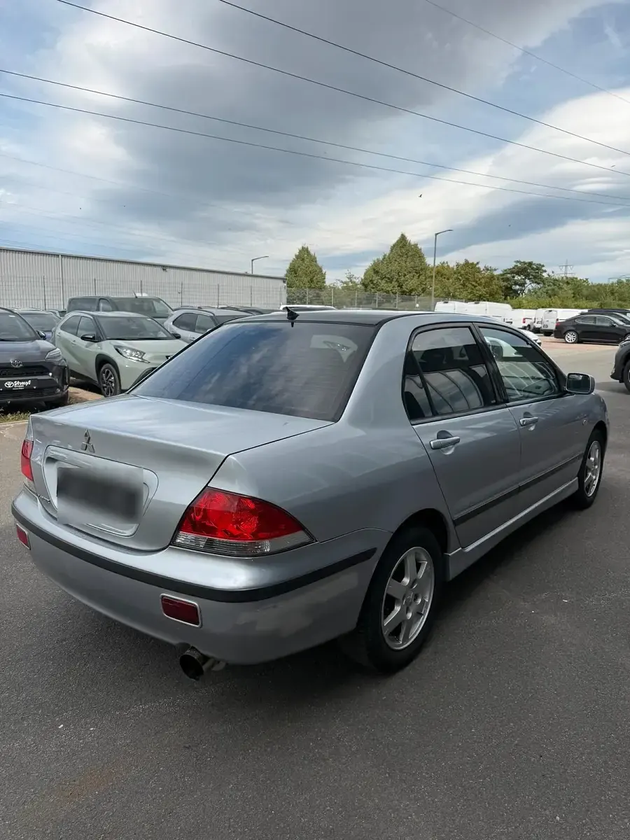 Gebraucht Mitsubishi Lancer 98 PS (72 kW) 2004 Silber Limousine