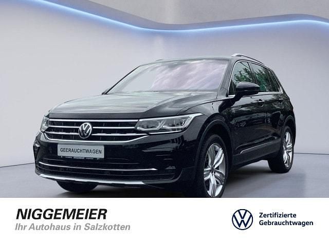 Deep black perleffekt (metallic) Gebraucht 2021 VW Tiguan Elegance SUV | 32.695 € (Fairer Preis) - Bild 1/4