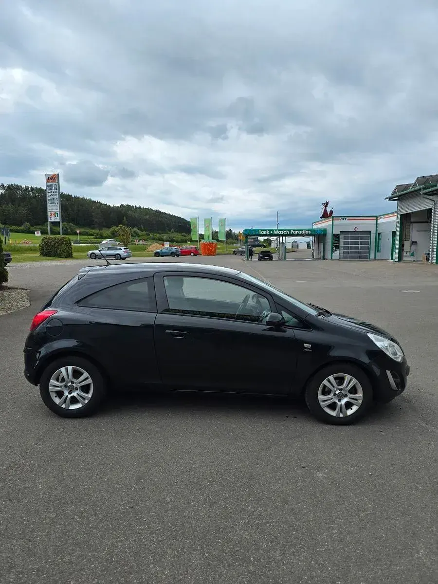 Gebraucht Opel Corsa Active 87 PS (63 kW) 2013 Schwarz Kleinwagen