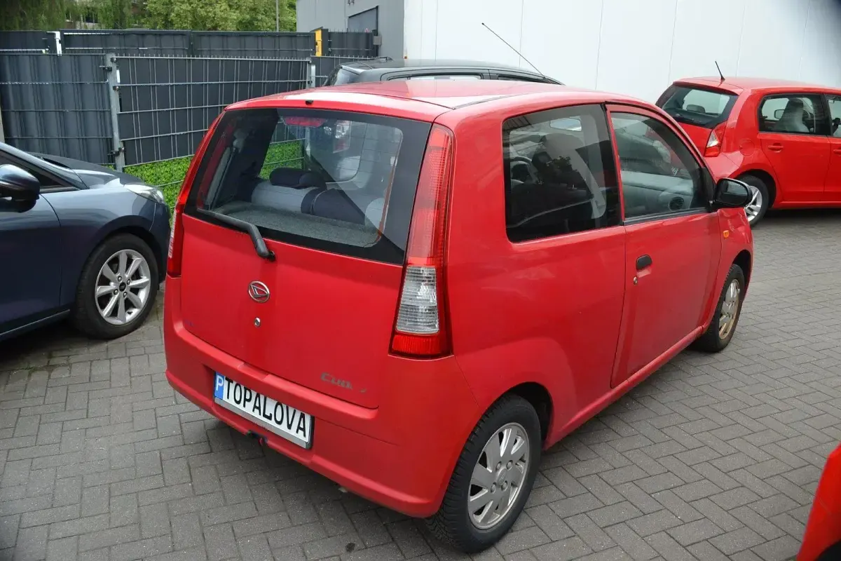 Gebraucht Daihatsu Cuore 58 PS (42 kW) 2005 Rot Kleinwagen