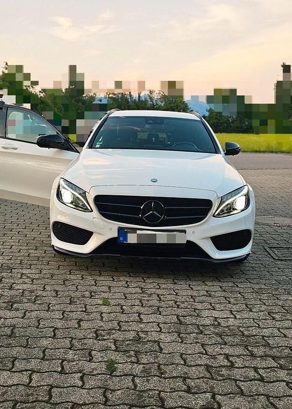 Weiß Gebraucht 2018 Mercedes C200 AMG line Kombi | 25.100 € (Fairer Preis) - Bild 1/4