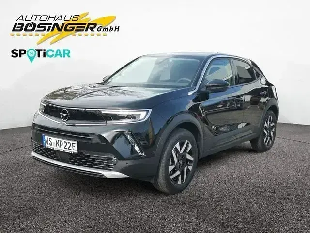 Gebraucht Opel Mokka-e Elegance 100 kW (136 PS) 2023 Diamant schwarz/karbon schwarz SUV