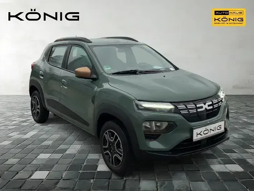 Gebraucht Dacia Spring Extreme 47 kW (65 PS) 2023 Olivgrün Kleinwagen