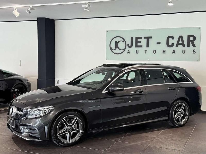 Grafitgrau metalliclack Gebraucht 2020 Mercedes C180 AMG Kombi | 29.900 € (Fairer Preis) - Bild 1/4