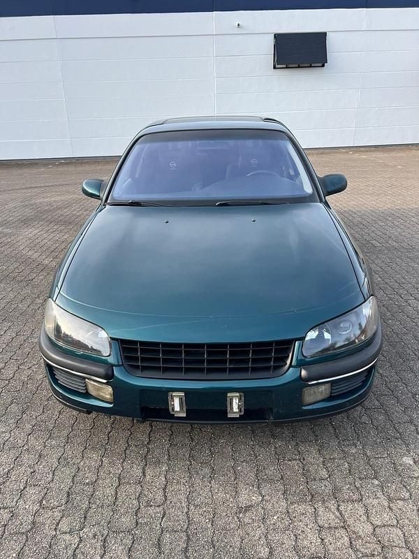 Occasion Opel Omega 150 ch (110 kW) 1997 Bleue Berline