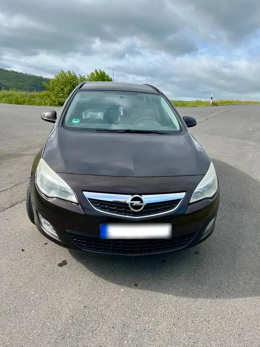 Usata Opel Astra 100 CV (73 kW) 2011 Marrone Station wagon
