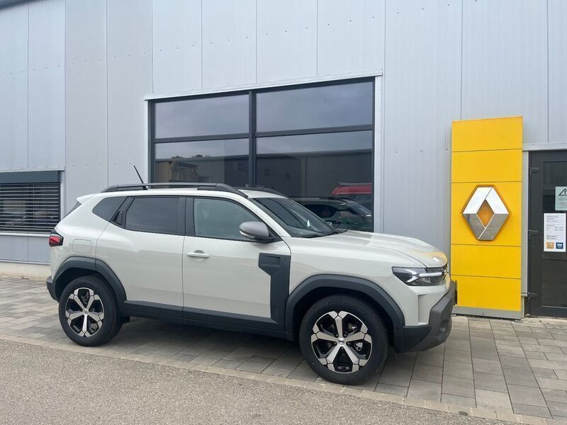 Braun Neu 2025 Dacia Duster Journey SUV | 29.990 € (Fairer Preis) - Bild 1/4