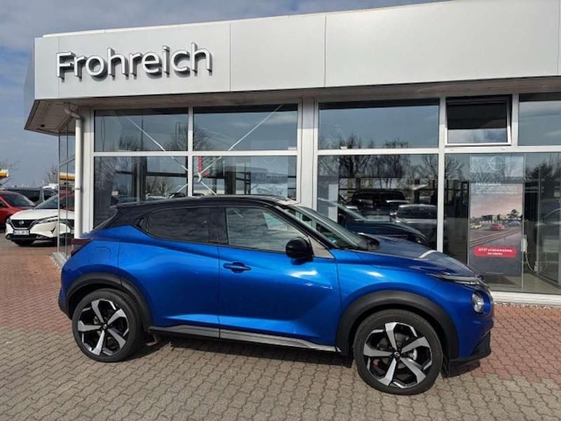 Gebraucht Nissan Juke Tekna 114 PS (83 kW) 2023 Magnetic blue metallic/dach in SUV