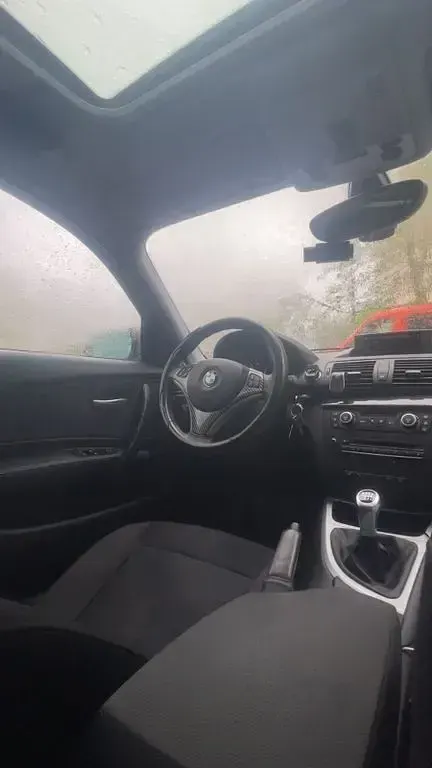 Gebraucht BMW 116 122 PS (89 kW) 2008 Schwarz Kleinwagen