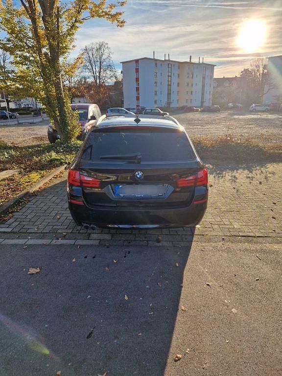 Second-hand BMW 520 184 CP (135 kW) 2012 Negru Break