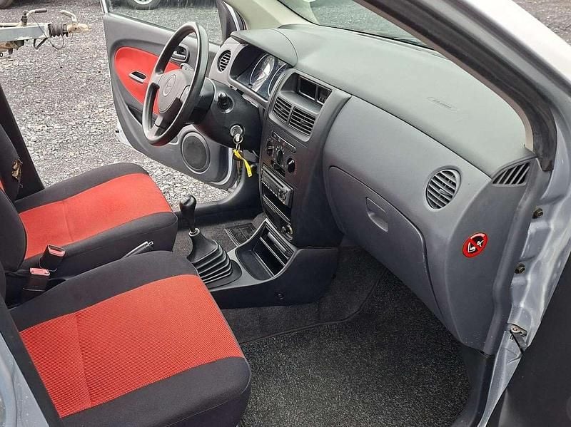 Gebraucht Daihatsu Cuore 58 PS (42 kW) 2006 Silber Kleinwagen