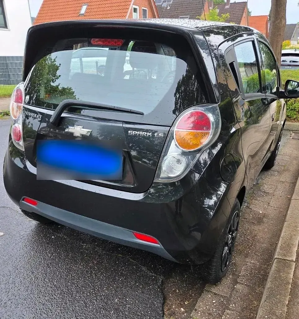 Gebraucht Chevrolet Spark 64 PS (47 kW) 2012 Schwarz Kleinwagen