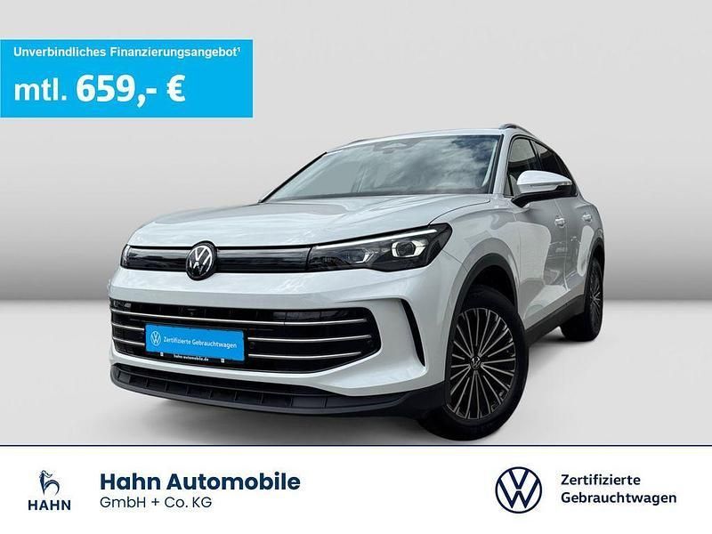 Oryxweiß perlmutteffekt Gebraucht 2024 VW Tiguan Elegance SUV | 40.370 € (Fairer Preis) - Bild 1/3