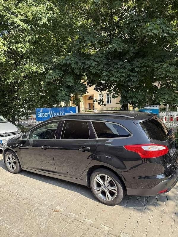 Schwarz Gebraucht 2013 Ford Focus Champions Edition Kombi | 4.199 € (Guter Preis) - Bild 1/4