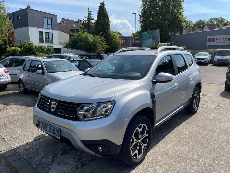 Platingrau Gebraucht 2018 Dacia Duster Prestige SUV | 13.490 € (Fairer Preis) - Bild 1/4