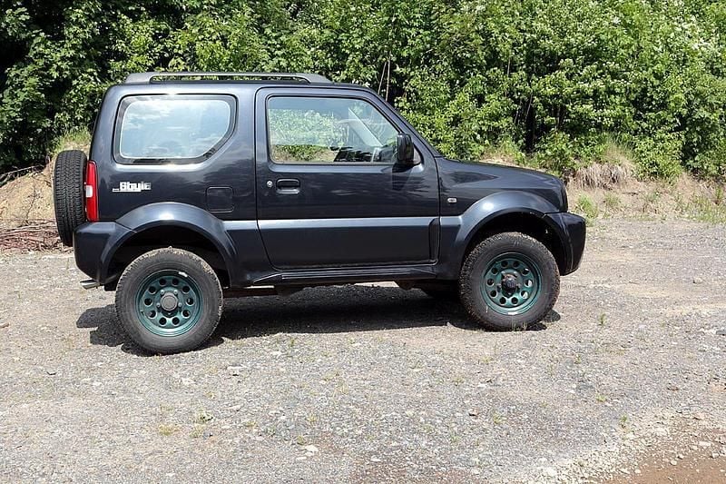 Gebraucht Suzuki Jimny 86 PS (63 kW) 2011 Schwarz SUV