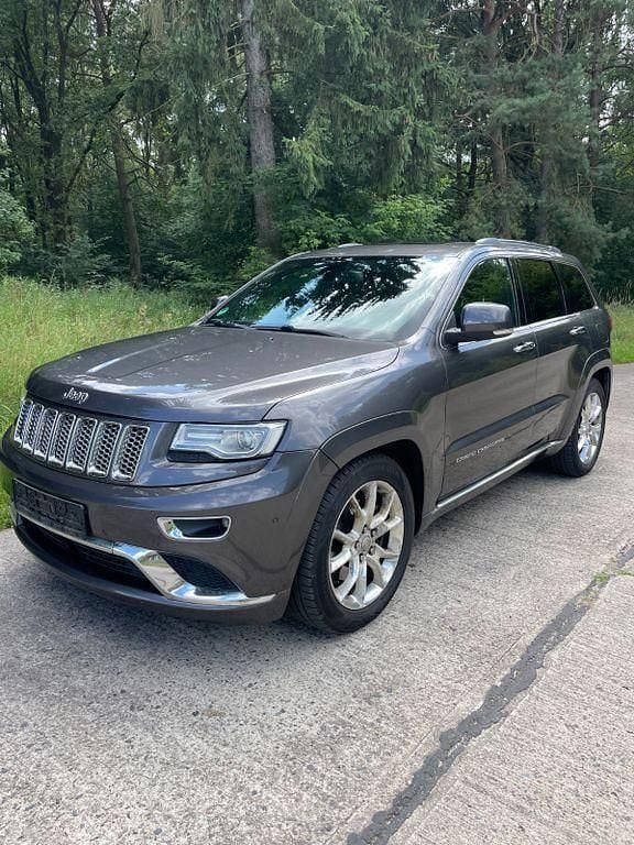 Grau Gebraucht 2014 Jeep Grand Cherokee Summit SUV | 11.900 € (Superpreis) - Bild 1/4