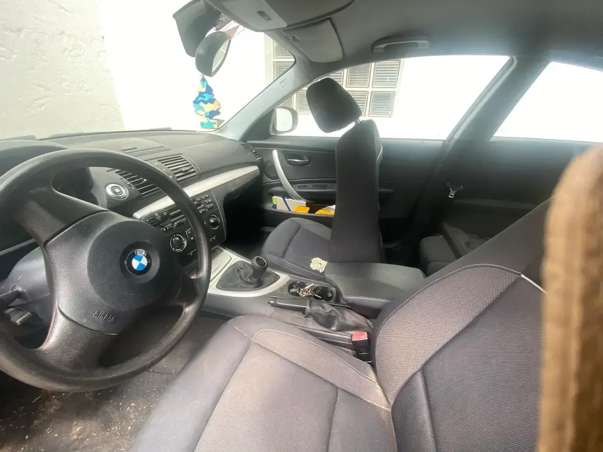 Używany BMW 116 116 KM (85 kW) 2009 Czarny Hatchback