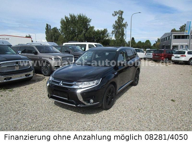 Schwarz Gebraucht 2016 Mitsubishi Outlander P-HEV Top SUV | 16.499 € (Guter Preis) - Bild 1/4