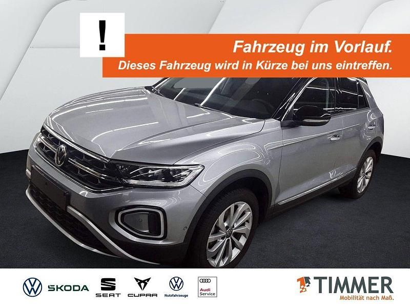 Pyritsilber metallic Gebraucht 2024 VW T-Roc Style SUV | 27.390 € (Guter Preis) - Bild 1/4