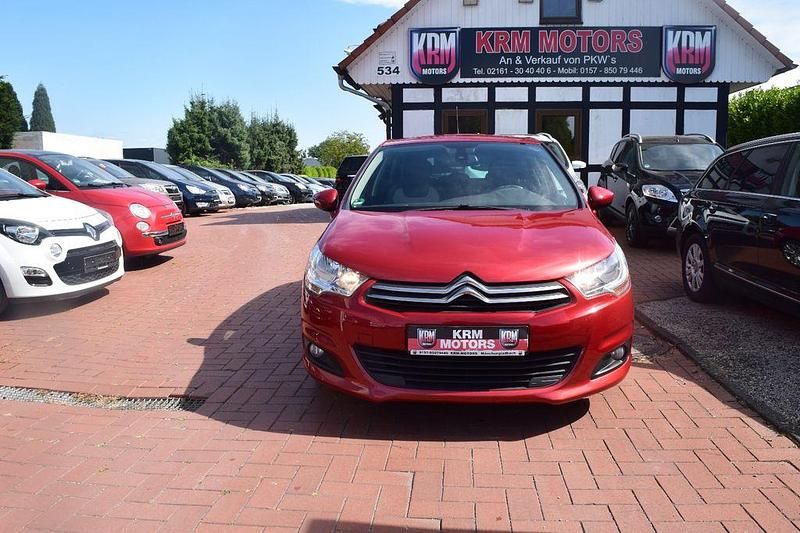 Rot Gebraucht 2013 Citroën C4 Limousine | 5.990 € (Fairer Preis) - Bild 1/4