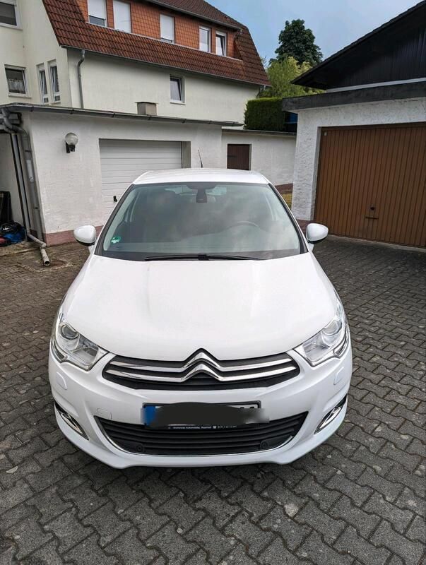 Weiß Gebraucht 2015 Citroën C4 Limousine | 6.269 € (Fairer Preis) - Bild 1/4