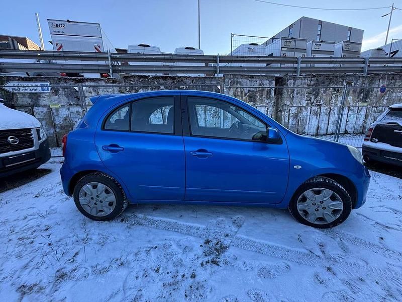 Gebraucht Nissan Micra Tekna 98 PS (72 kW) 2011 Active blue metallic Kleinwagen