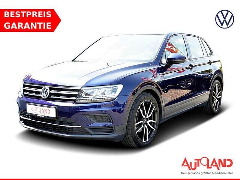 Blau Gebraucht 2017 VW Tiguan Trendline SUV | 21.490 € (Teuer) - Bild 1/4
